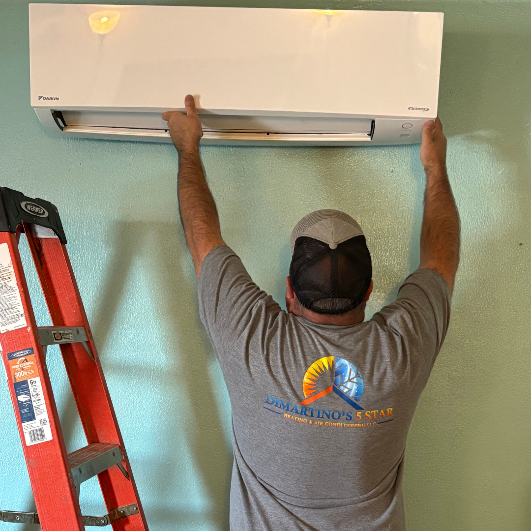 Ductless Mini Split Installation Salem Oregon - Expert AC Installation Professional technician installing Daikin ductless mini split air conditioning system on wall in Salem Oregon home