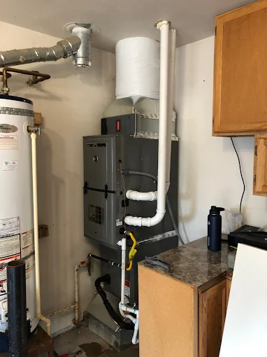 Expert Furnace Installation Services - Salem Oregon HVAC Professionals Professional furnace installation Salem Oregon basement utility room HVAC system setup